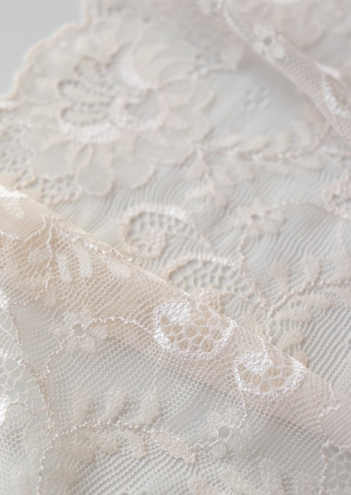 Dentelle rose ivoire